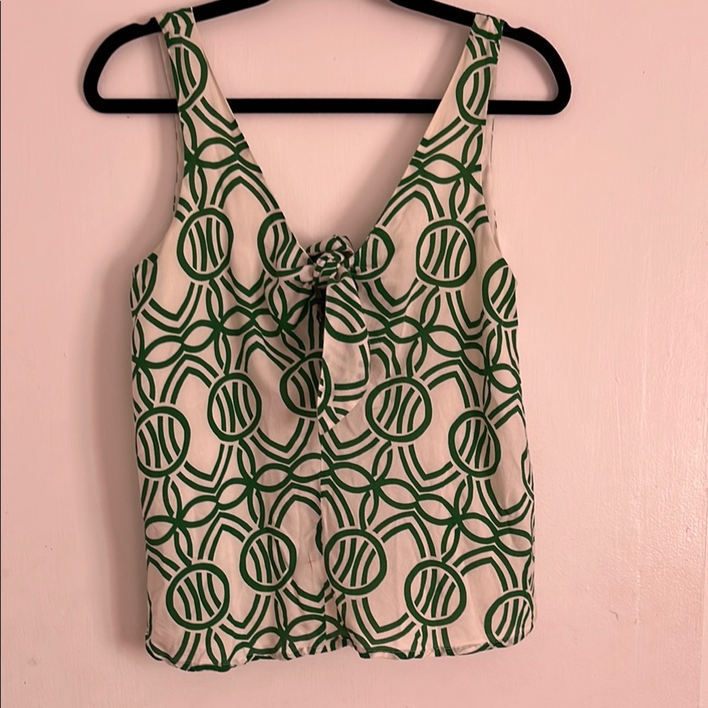 Green Patterned Top with bow detail and ruching in back . Brand Maeve size Xs